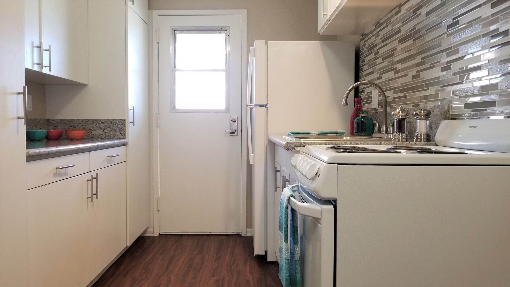 Cypress Senior Apartments renovated kitchen with mosaic backsplash