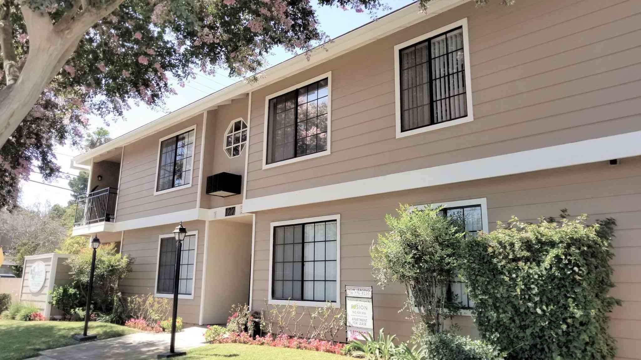leasing office exterior and resident walkway